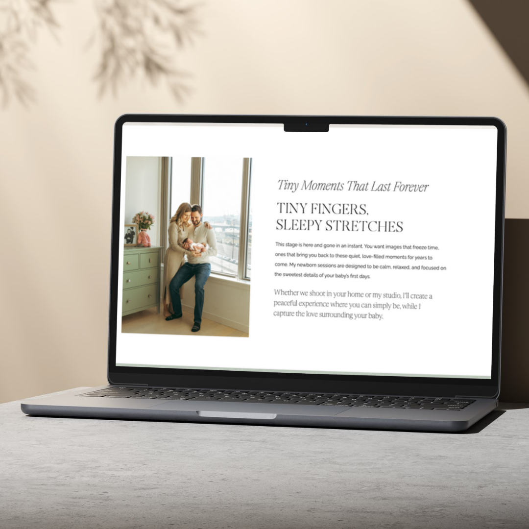 newborn photographer website on laptop sitting on a table